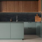 Minimalist home kitchen interior bar island, green and wooden cabinet on concrete floor. Sink, stove and oven with kitchenware. Dark cooking space design in luxury apartment. 3D rendering